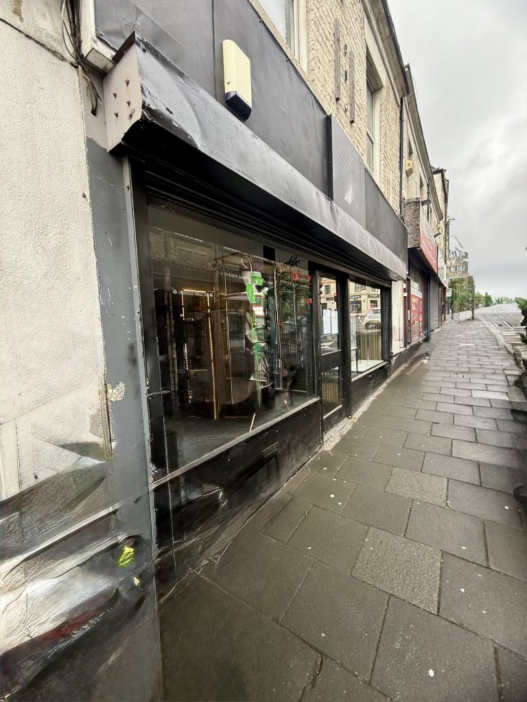 Shopfront in Fenham, Newcastle, where Newcastle Commercial and Residential Lockout Specialists repaired a faulty roller shutter door using an external power source and replaced the mortice lock for the landlord.