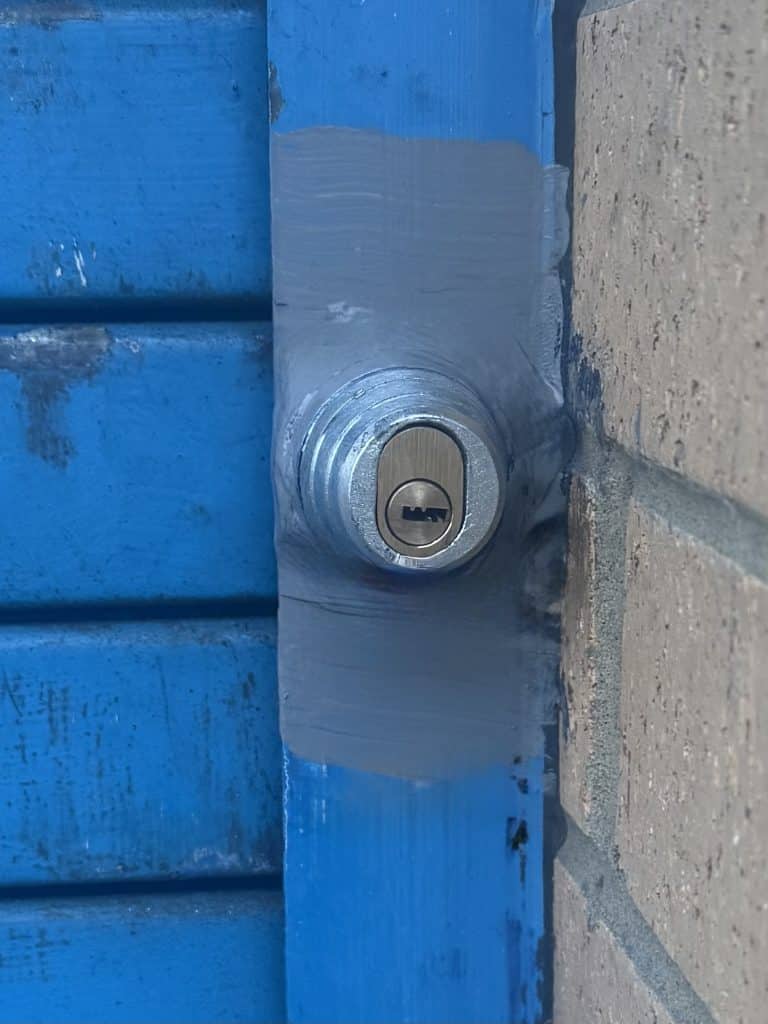 Commercial Locksmith Cramlington NE23 Industrial Roller Shutter Lockout on Nelson Industrial Estate At Newcastle Commercial & Residential Lockout Specialists, we operate as a commercial locksmith in Cramlington for factories, industrial units, landlords and managing agents across Northumberland. This recent commercial lockout in Cramlington, on Nelson Industrial Estate, highlights how incorrect shutter lock installation can lead to full operational shutdown — and why businesses need a specialist commercial locksmith, not a general lock fitter. Commercial Lockout Location – Nelson Industrial Estate, Cramlington This job was carried out on Nelson Industrial Estate in Cramlington, located at the bottom of Nelson Village, near the site of the old Nelson Pit and within close proximity to Cramlington Train Station. This is a busy commercial area serving manufacturing, storage and logistics businesses, where lost access means lost productivity. Newcastle Commercial and Residential Lockout Specialists is a Cramlington commercial locksmith, Newcastle Commercial and Residential Lockout Specialists regularly attend this estate and surrounding industrial zones. The Call-Out – Commercial Roller Shutter Lockout Factory staff were completely locked out after a roller shutter doors failed to open. The roller shutter door was secured by two centre-style shutter locks that had failed simultaneously, leaving the business unable to operate. This was initially reported as a lock failure. In reality, it was a commercial locksmith installation failure. What Went Wrong – Incorrect Commercial Lock Installation The shutter had been fitted with centre shutter locks installed mid-lath, one on each side of the shutter curtain. This is incorrect. Centre shutter locks are designed for central installation into the end rail, not into the moving curtain. Any experienced commercial locksmith understands that shutter laths are not load-bearing components. Installing locks in this way causes: • Curtain flex under load • Twisting forces on lock bodies • Fixings loosening over time • Predictable mechanical failure In this case, the previous locksmith had attempted a “creative” solution rather than using industry-approved commercial shutter locking methods. Entry Gained – Why the System Failed So Easily Once access to the fixings was achieved, the failure became obvious. The incorrectly fitted shoot bolts were simply unscrewed and the entire locking system came apart. There was no proper engagement with reinforced shutter structure. This confirmed that the shutter locks had never been correctly installed by a competent commercial locksmith. Making Good – Repairing Damage Left by Poor Workmanship The lockout itself was not the biggest issue. The real problem was the damage caused by the previous installation. Multiple unnecessary holes had been drilled into square shutter laths, which are not readily available as replacement parts. Full curtain replacement would have meant unnecessary cost and downtime for the business. As a specialist commercial locksmith covering Cramlington, we opted for a structural repair: • Fabricated aluminium reinforcement plates • Blanked off redundant holes • Restored strength to the affected laths • Created a solid base for correct locking hardware The shutter colour in this area of Cramlington’s Nelson Industrial Estate is landlord-specified RAL blue, so the repair was finished intentionally and professionally, not disguised. The Correct Commercial Solution – Bullet Lock Installation With the shutter reinforced, Newcastle Commercial and Residential Lockout Specialists installed a commercial-grade shutter locking system: • Reinforced shutter bullet lock housings • Italian oval shutter bullet locks • One installed either side of the shutter • Fixed into load-bearing, reinforced positions This setup provides: • Correct load transfer • Long-term reliability • High resistance to forced entry • Simple operation for staff Most importantly, it prevents repeat lockouts — the hallmark of a properly executed commercial locksmith repair. Why Businesses in Cramlington Need a Specialist Commercial Locksmith Industrial shutters are not domestic doors. They flex, move and carry load. Locking systems must be chosen and installed with this in mind. Incorrect commercial lock installations can lead to: • Emergency lockouts • Production downtime • Safety concerns • Insurance complications • Repeated failures As a commercial locksmith serving Cramlington, we regularly correct poor workmanship carried out by non-specialists. One Call, Multiple Access Solutions Many commercial lockouts don’t exist in isolation. Alongside our commercial locksmith services in Cramlington, we also operate a dedicated vehicle access and key replacement service. If a lockout involves a shutter, a personnel door, or a vehicle key issue on site, we can handle it. Find out more about our car key and vehicle entry services This integrated approach allows us to support businesses quickly and efficiently with one trusted local provider. ⸻ Commercial Locksmith – Frequently Asked Questions Why did the shutter locks fail? They were the wrong type of lock, installed in the wrong position. Centre locks must be fitted into the end rail, not into the curtain laths. Can a commercial locksmith repair damaged shutter laths? Yes. In many cases, reinforcement and blanking plates can restore strength without full curtain replacement. Are poorly installed shutter locks an insurance risk? Yes. Non-compliant or incorrectly installed security hardware can cause issues during insurance claims. Do you cover all of Cramlington? Yes. We cover Nelson Industrial Estate, Nelson Village, Beaconhill, East Hartford, Dudley and surrounding areas, as well as wider Northumberland and the North East. Do you provide emergency commercial locksmith services? Yes. Newcastle Commercial and Residential Lockout Specialists provide emergency access, repairs and security upgrades for commercial and industrial premises.